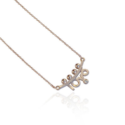 Bespoke 18K rose gold necklace with abstract human figures and a diamond, designed by Elsa Mouzaki.